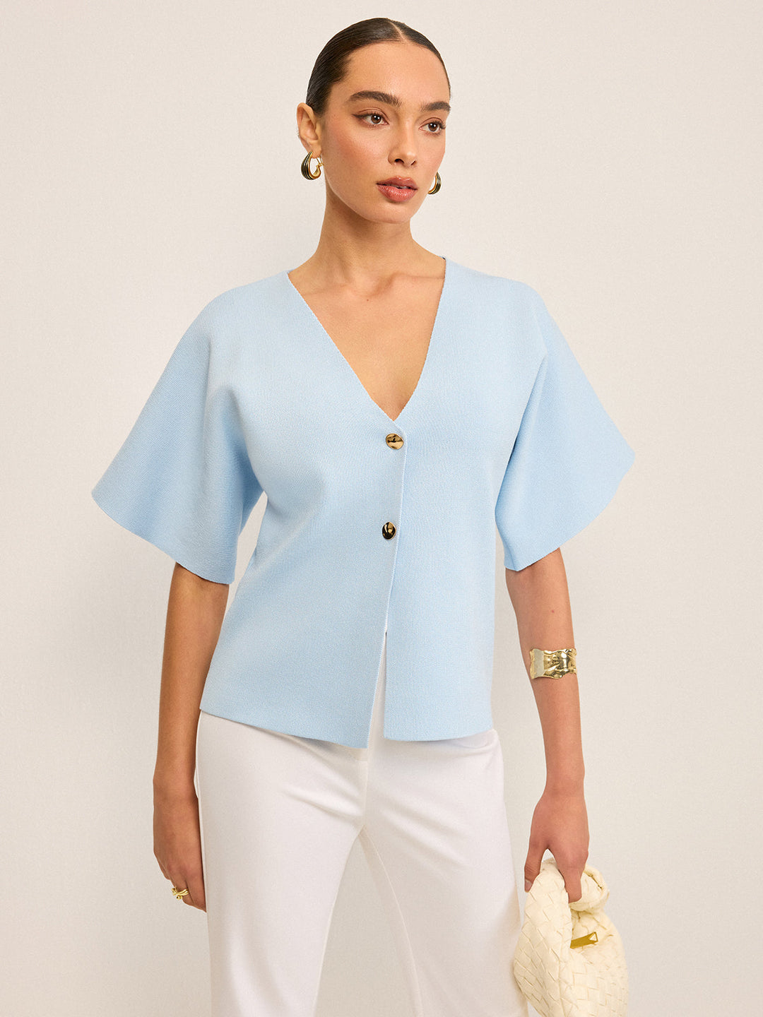 Cardigan en tricot boutonné en V