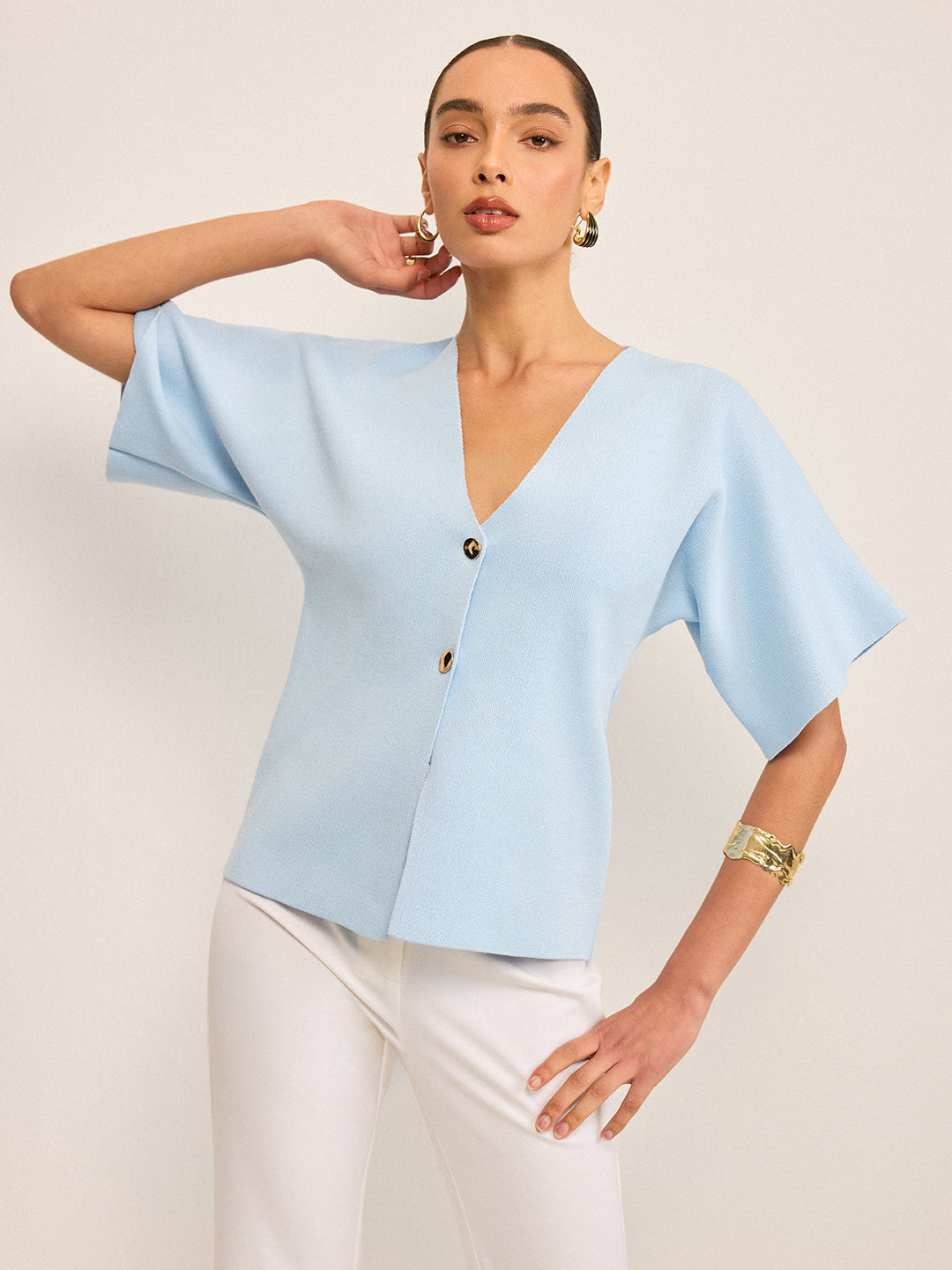 Cardigan en tricot boutonné en V