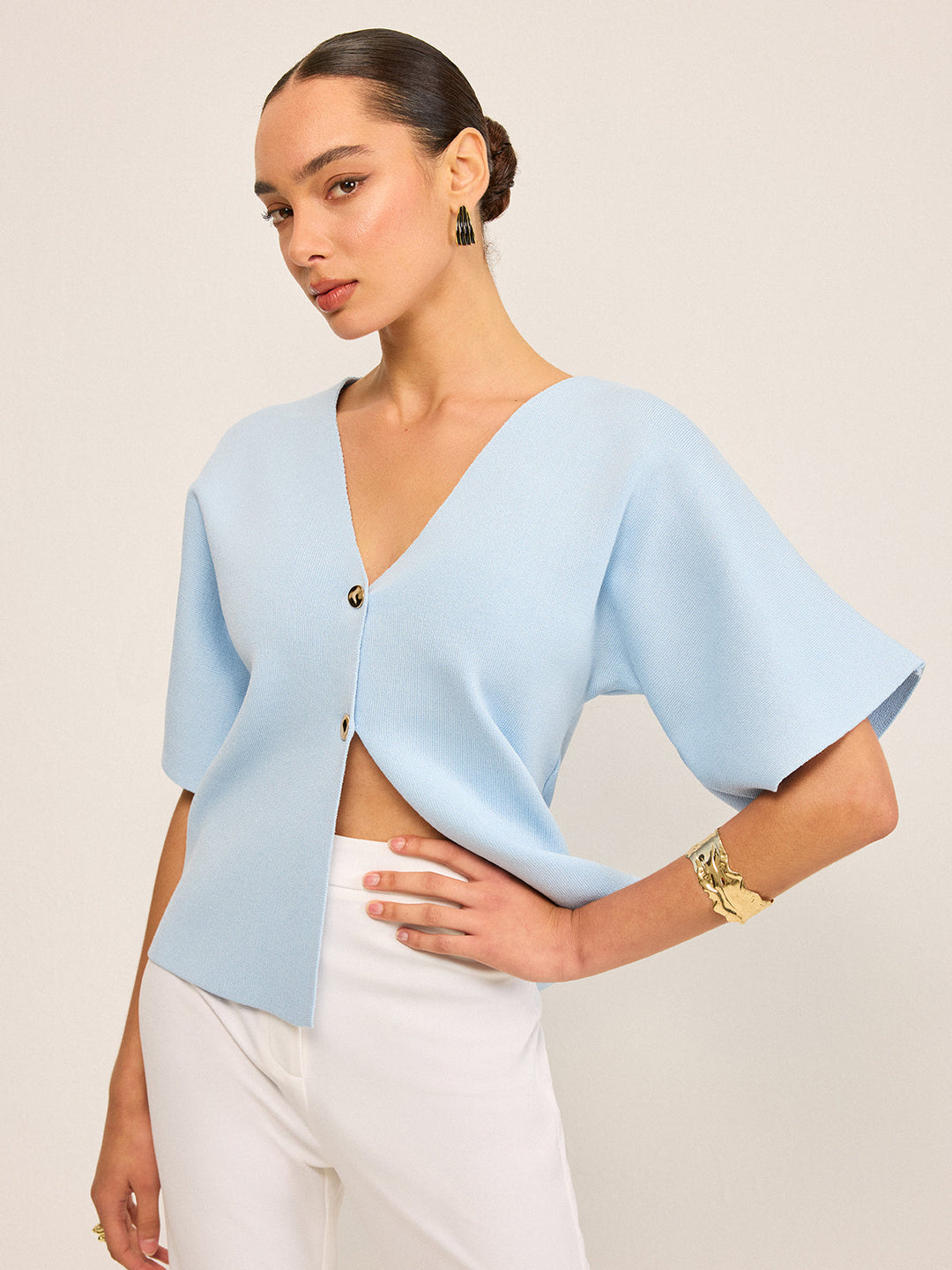 Cardigan en tricot boutonné en V