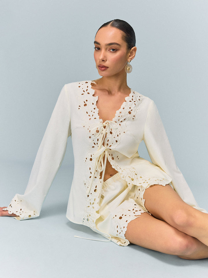 Haut réversible brodé en dentelle semi-transparente