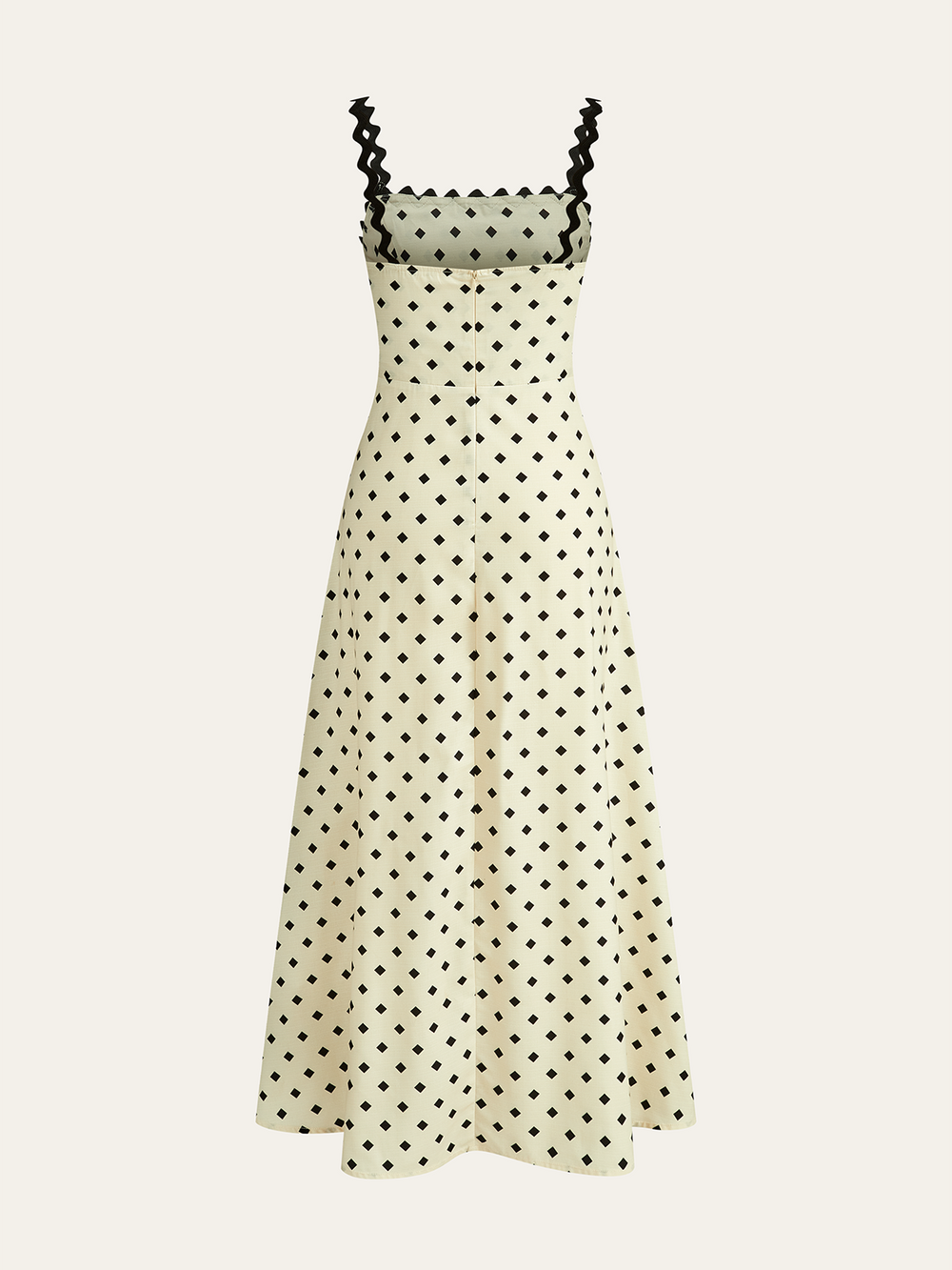 Robe mi-longue à pois avec bretelles festonnées