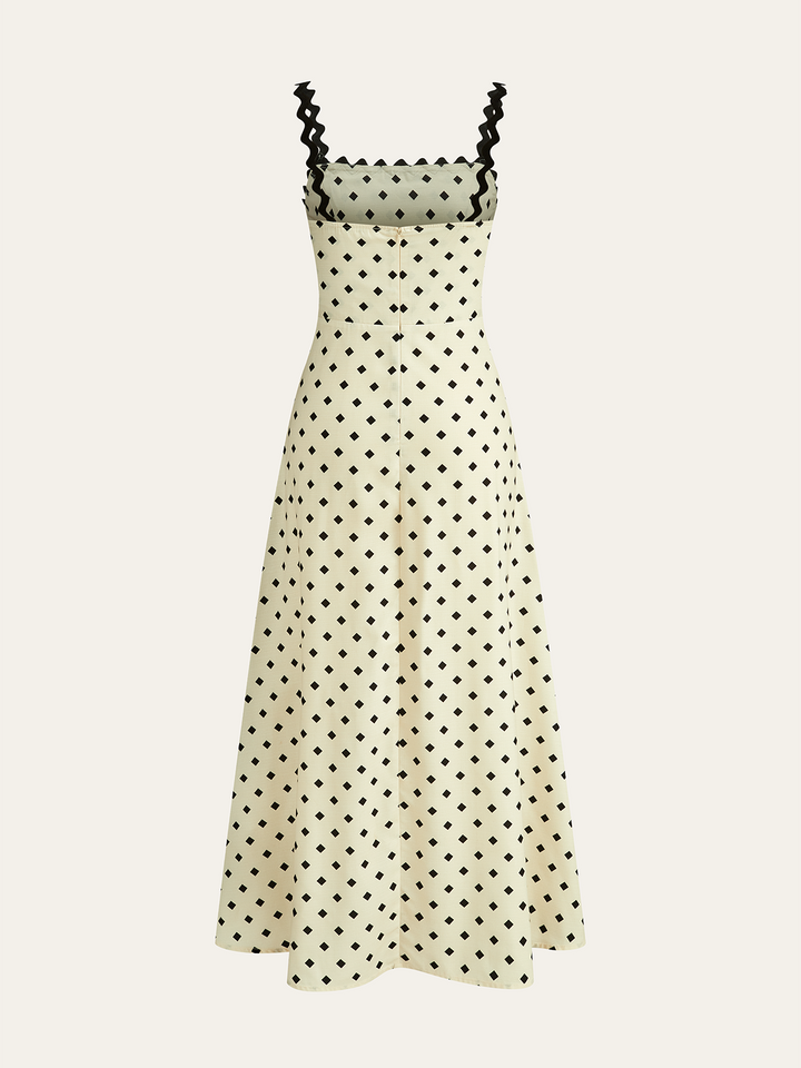 Robe mi-longue à pois avec bretelles festonnées