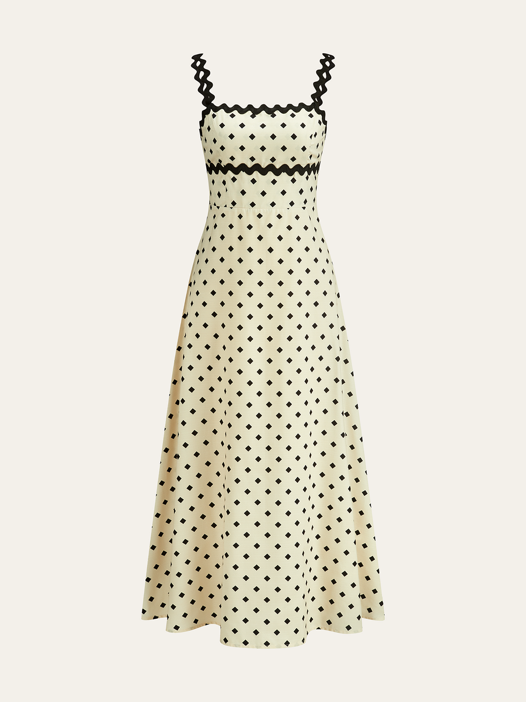 Robe mi-longue à pois avec bretelles festonnées