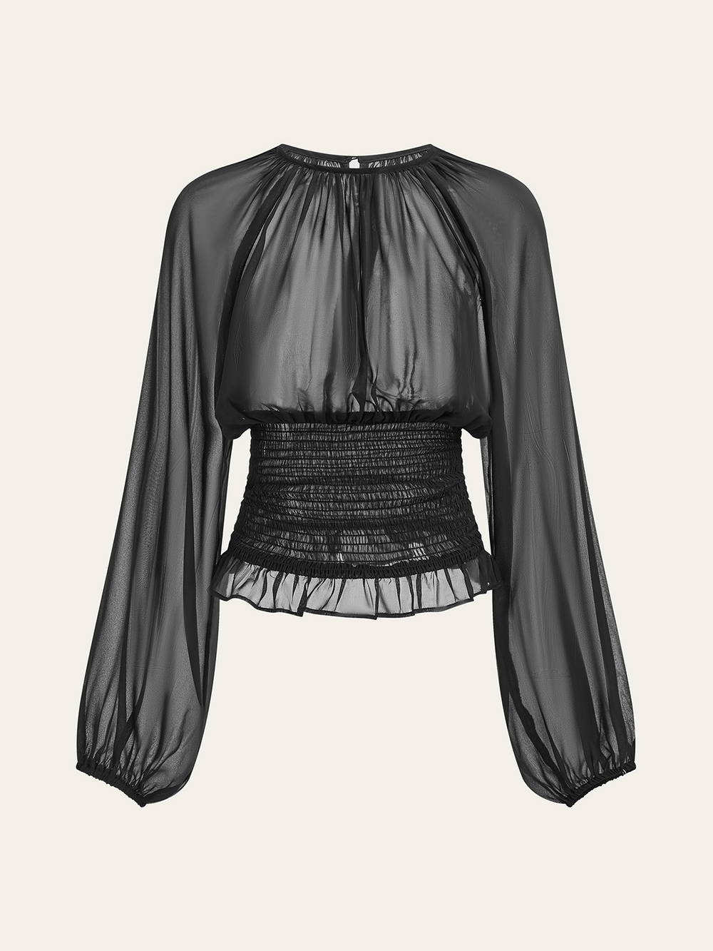 Blouse en mousseline sheer à taille smockée