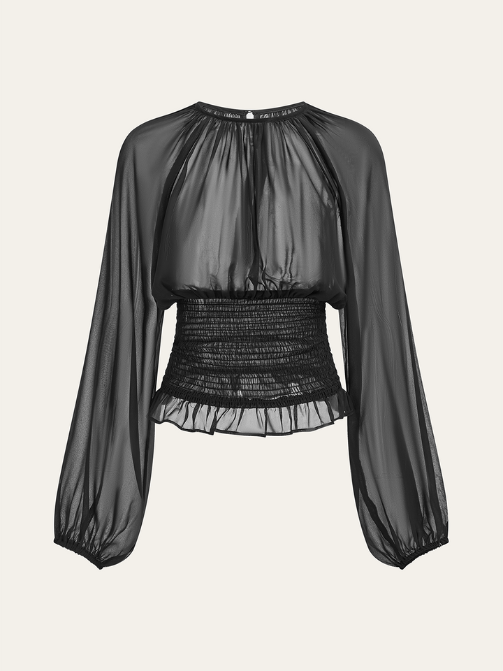 Blouse en mousseline sheer à taille smockée