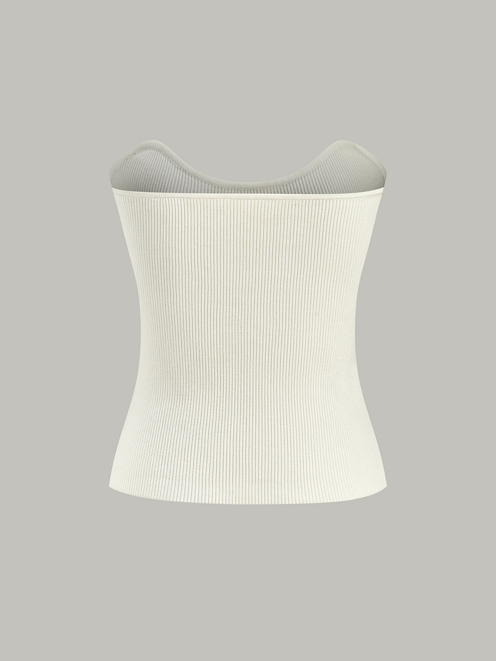 Gilet en maille à découpes métalliques