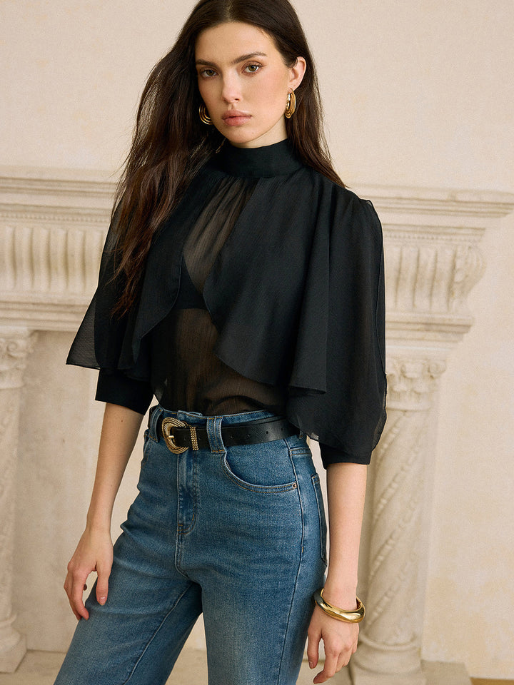 Blouse en mousseline transparente avec détail nœud au dos