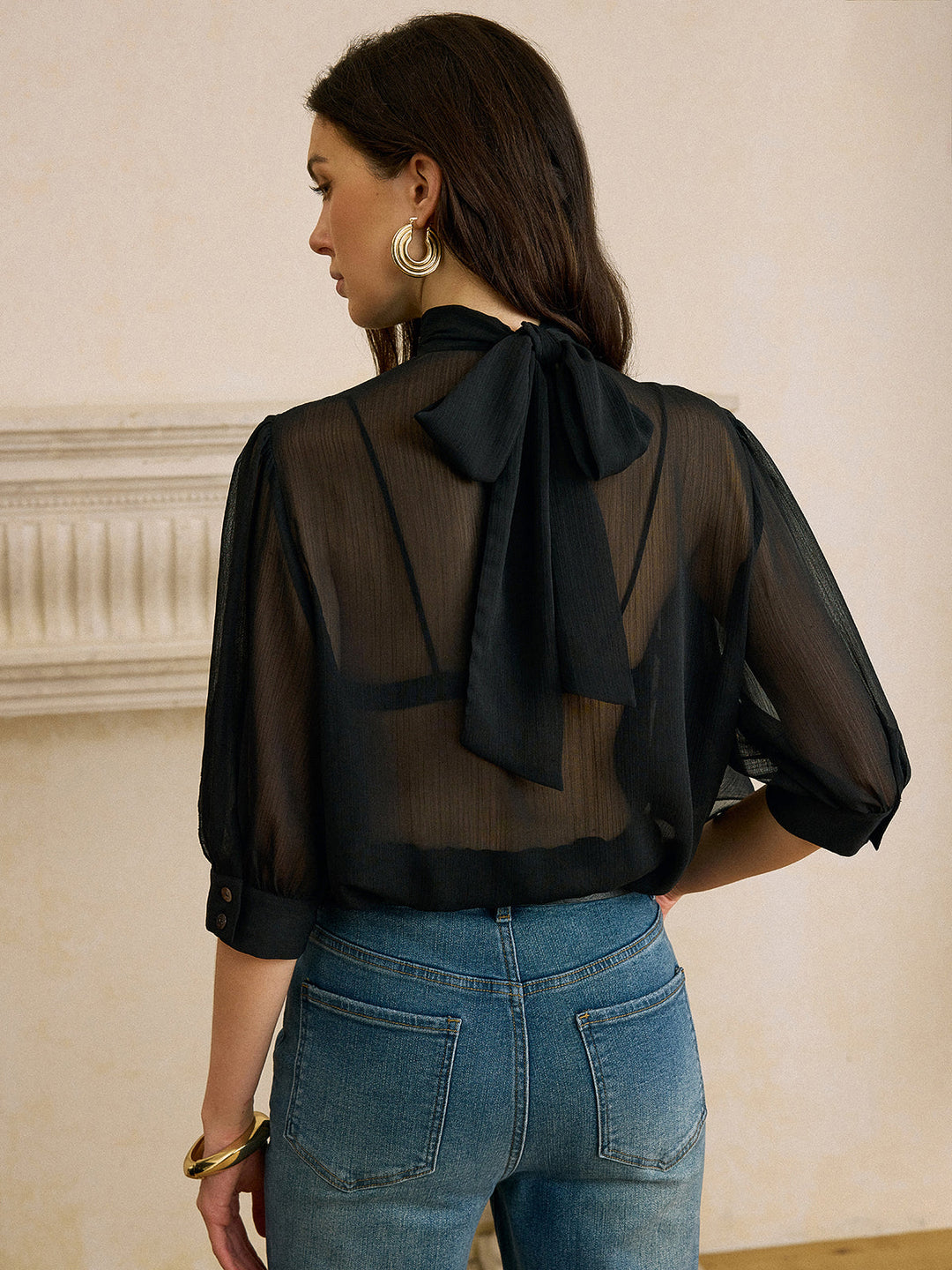 Blouse en mousseline transparente avec détail nœud au dos