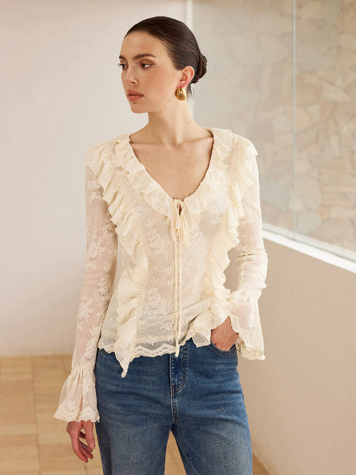 Blouse à col en V avec volants en dentelle semi-transparente