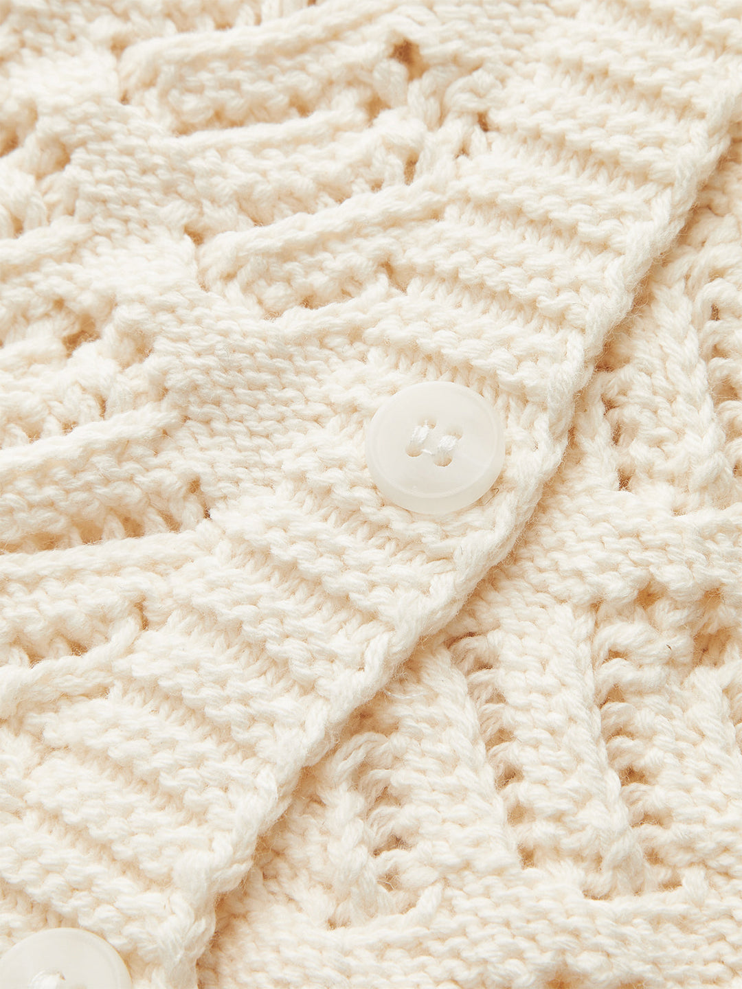 Cardigan sans manches en tricot avec fermeture boutonnée