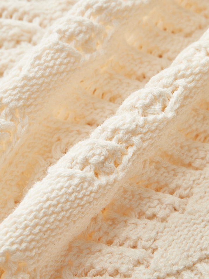 Cardigan sans manches en tricot avec fermeture boutonnée