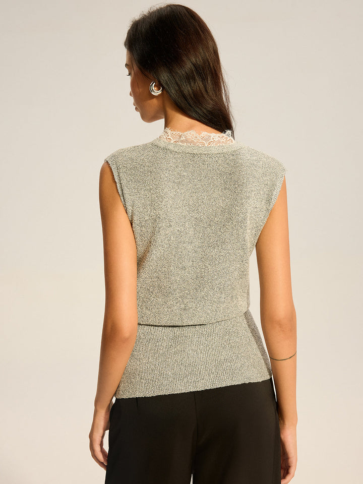Gilet en tricot avec finition en dentelle resserrant la taille
