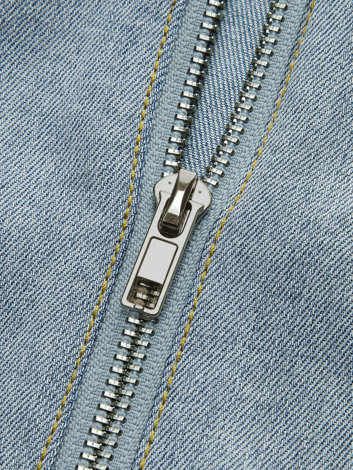 Robe sans manches en jean à boutonnage sur le devant