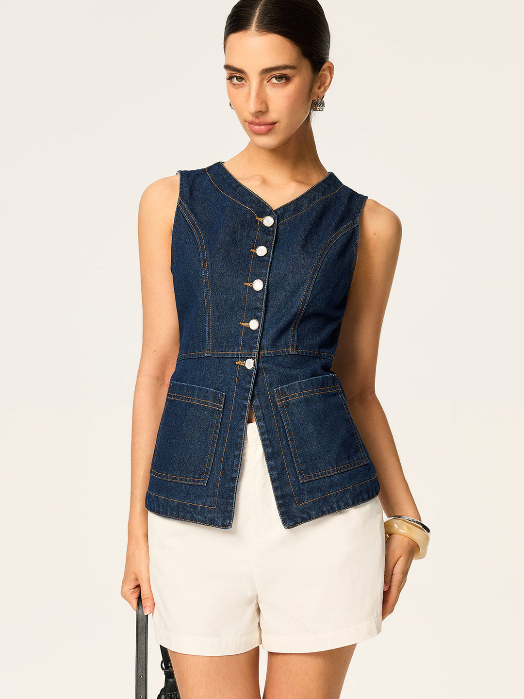 Gilet sans manches ajusté en jean boutonnné