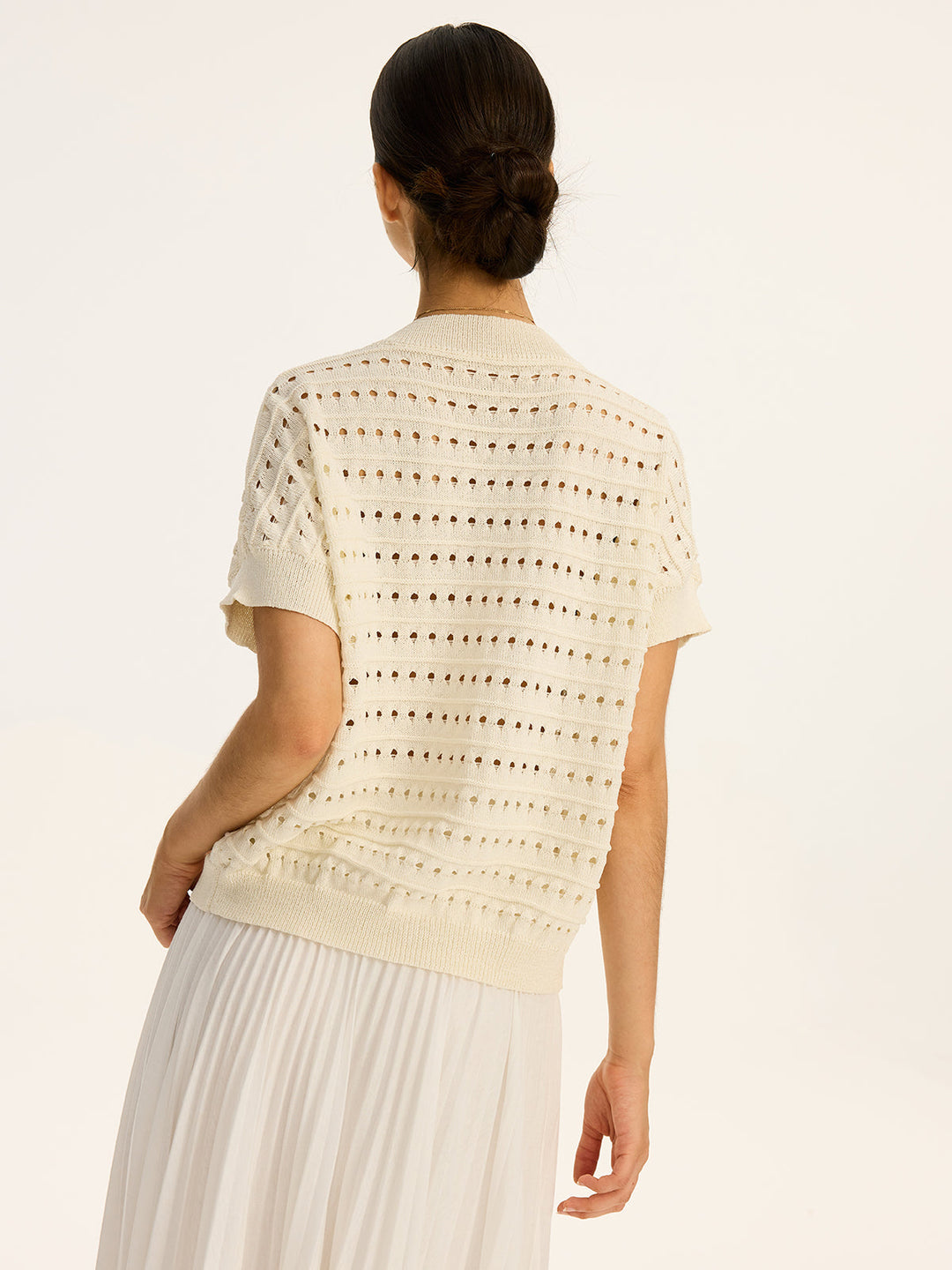 Cardigan à col en V en tricot œillet avec bouton en métal