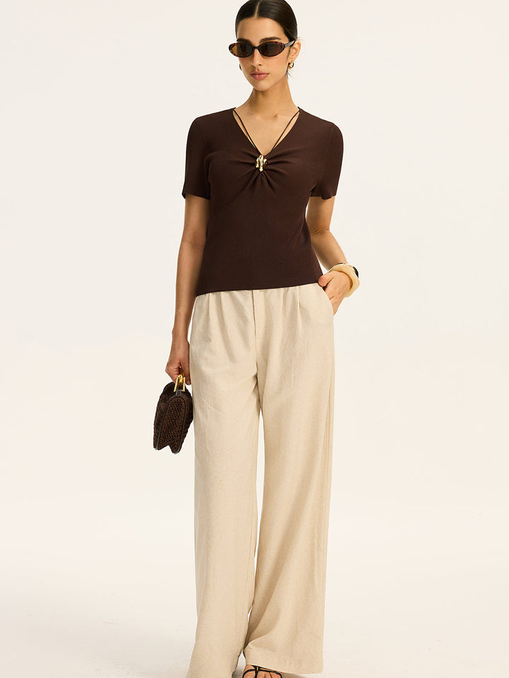Haut en tricot côtelé avec détails métalliques