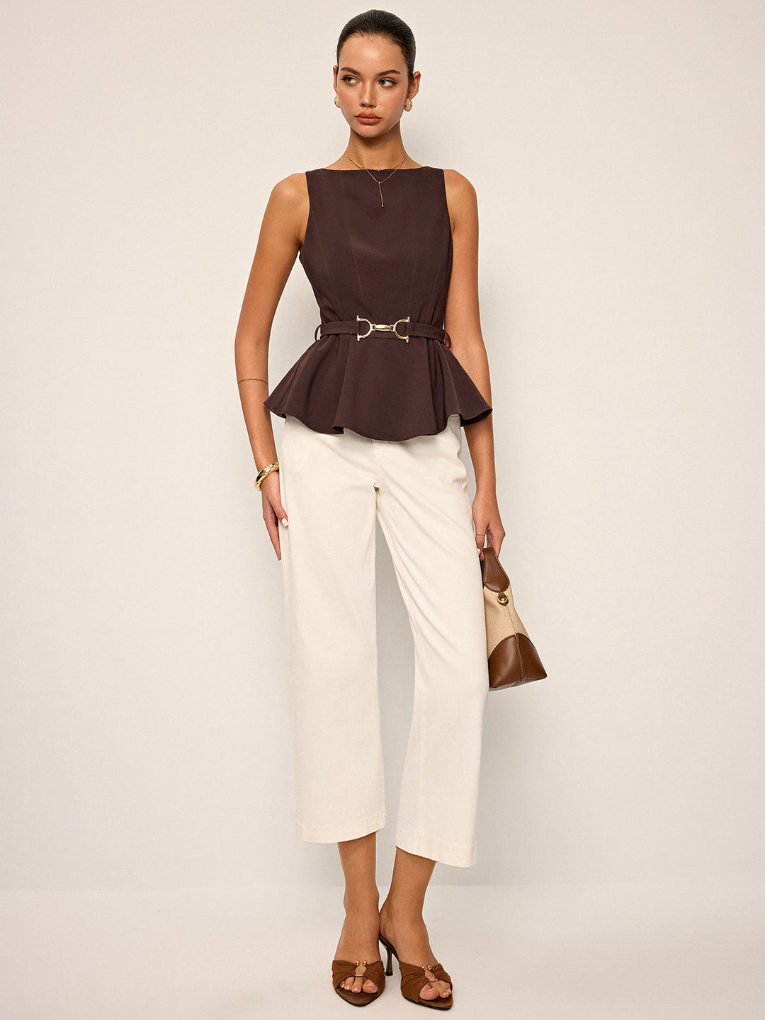 Top péplum sans manches avec ceinture à boucle métallique