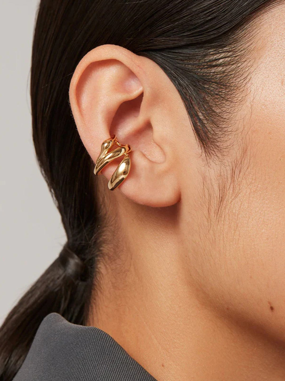 Manchette d'oreille à forme géométrique