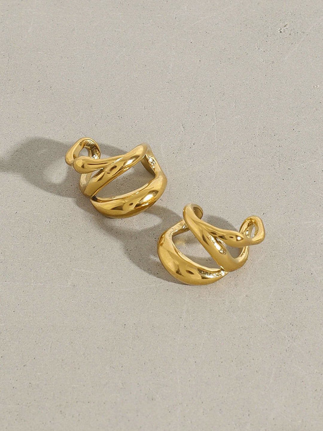 Manchette d'oreille à forme géométrique