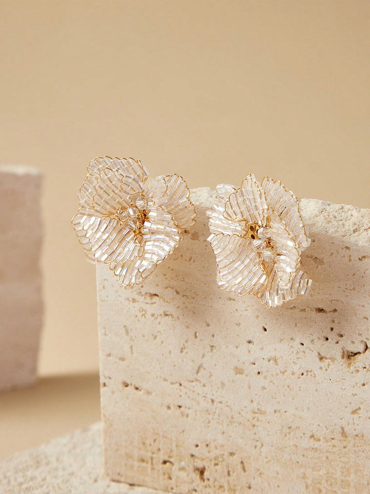 Boucles d'oreilles fantaisie en forme de fleur perlée