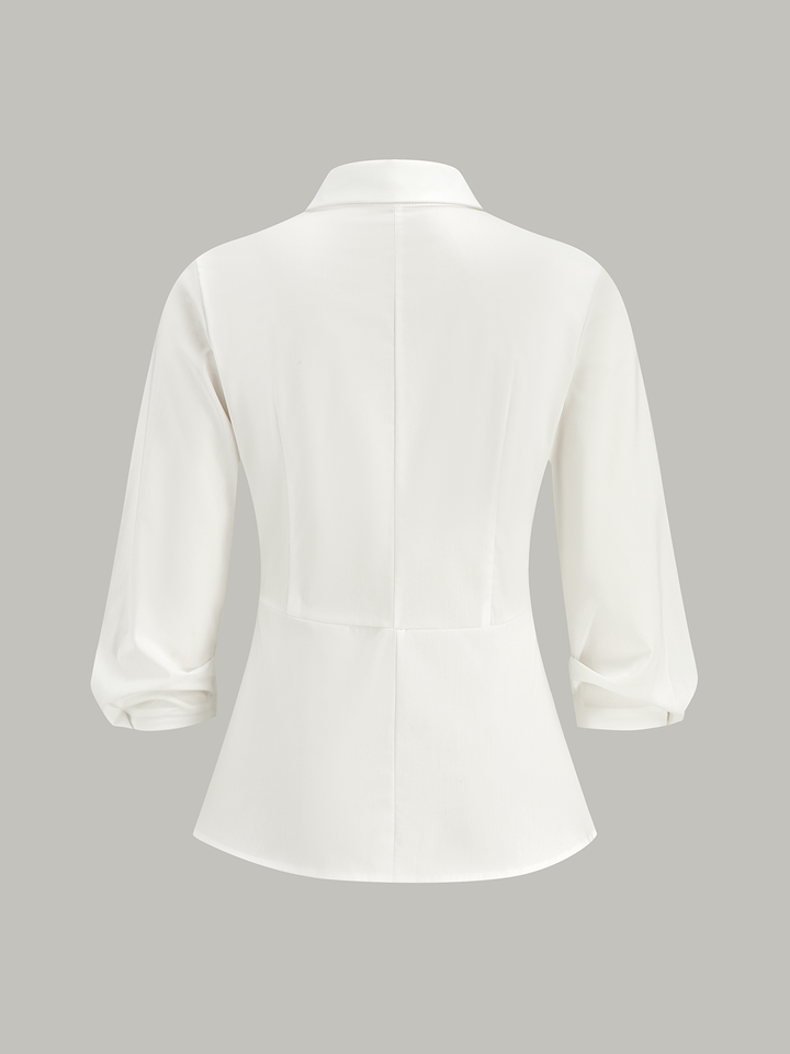 Chemise asymétrique à boucle métallique