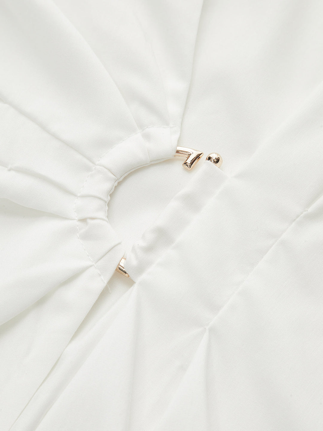 Chemise asymétrique à boucle métallique