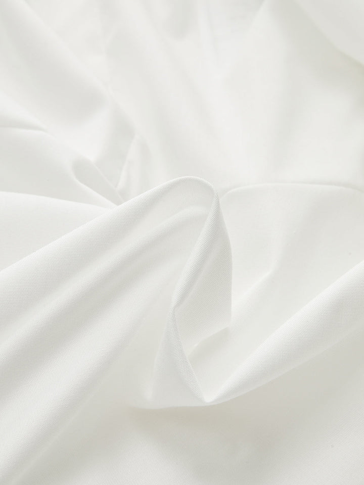 Chemise asymétrique à boucle métallique