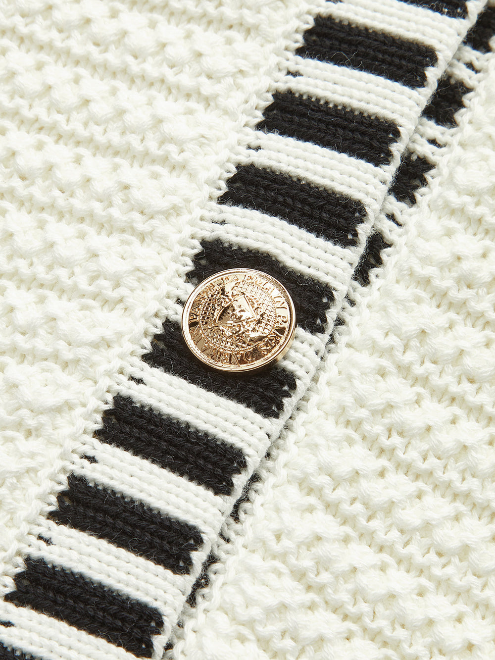 Gilet en maille avec bordure rayée