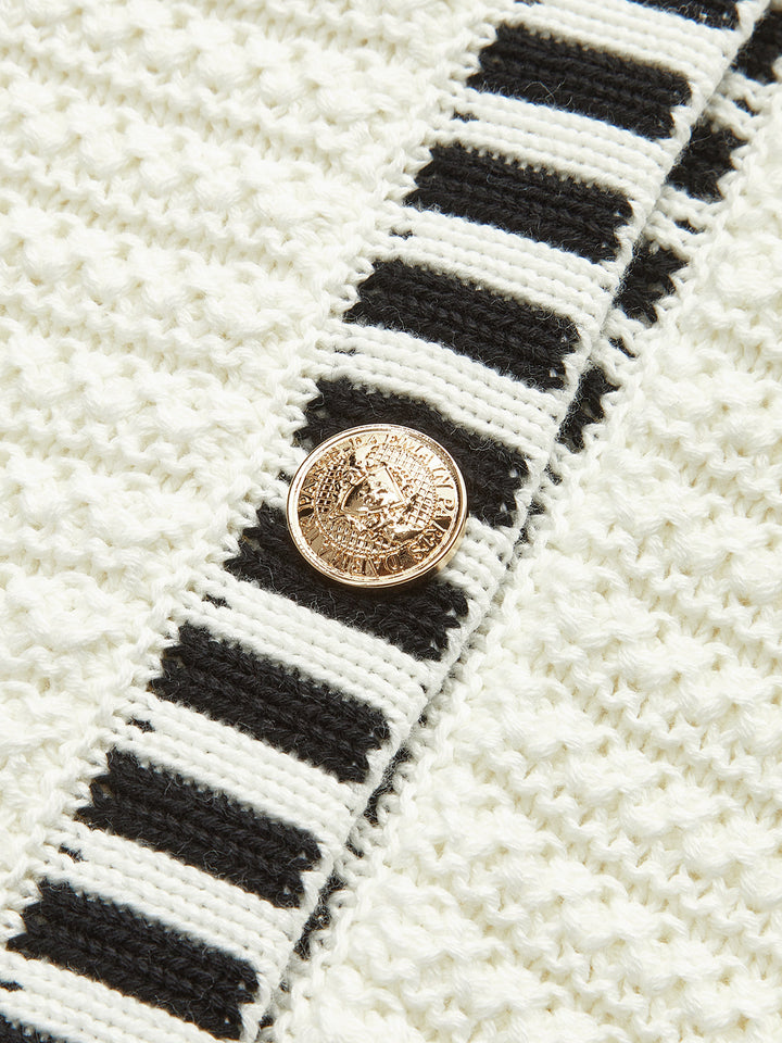 Gilet en maille avec bordure rayée