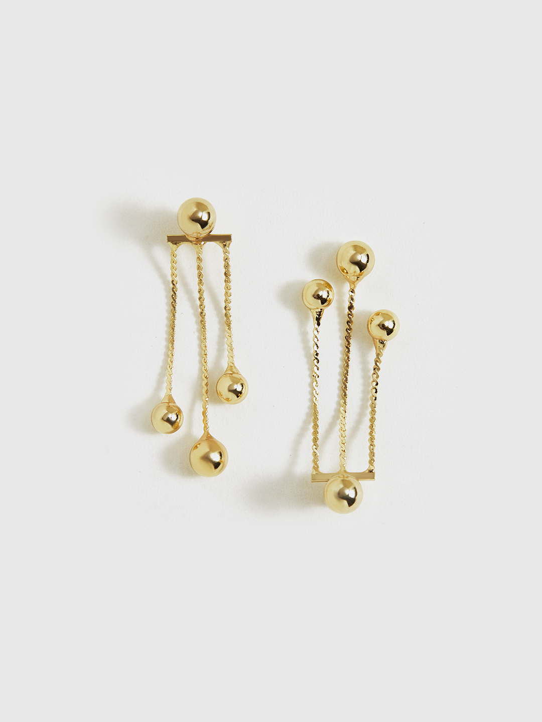 Boucles d'oreilles pendantes dorées