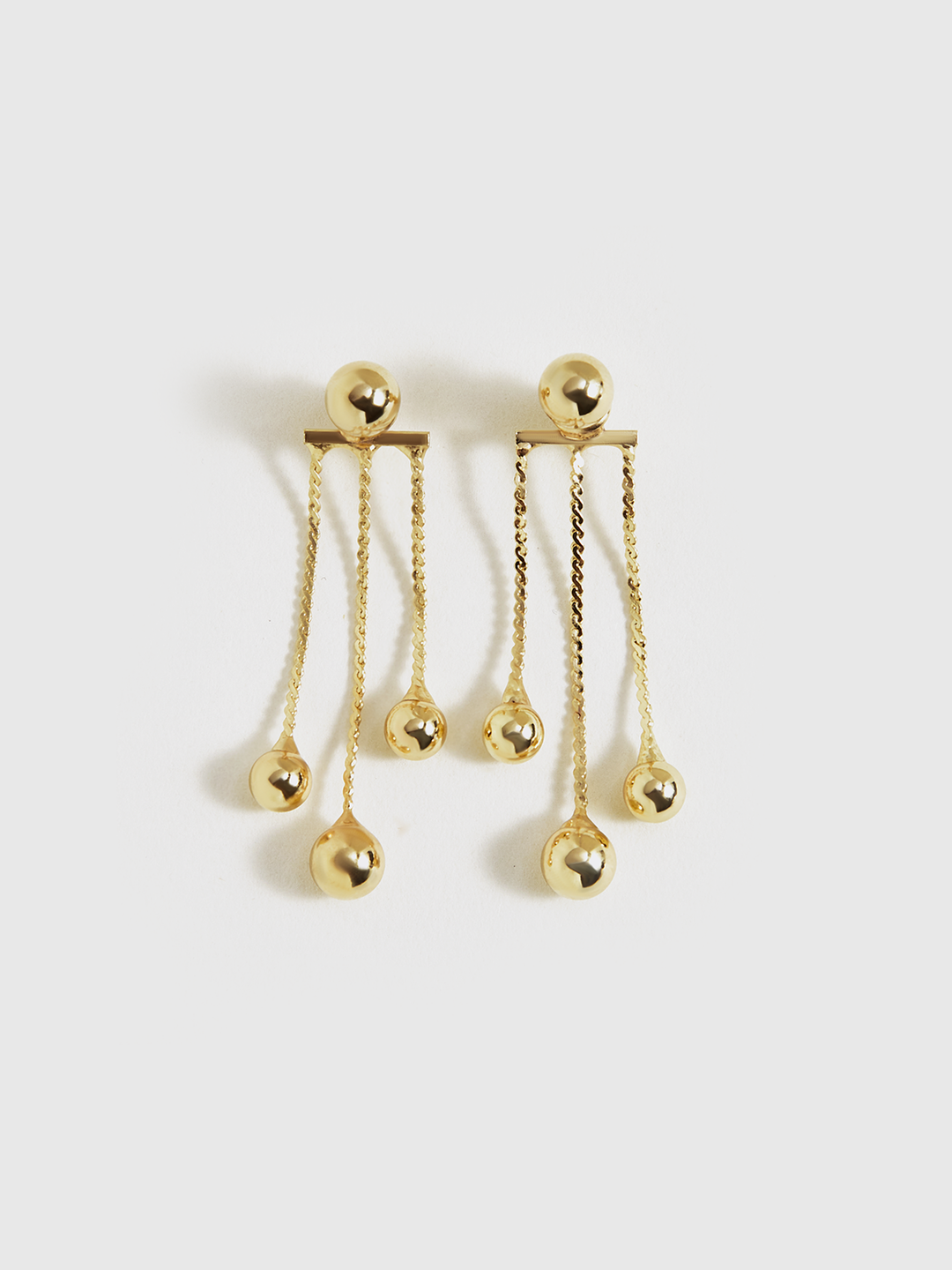 Boucles d'oreilles pendantes dorées