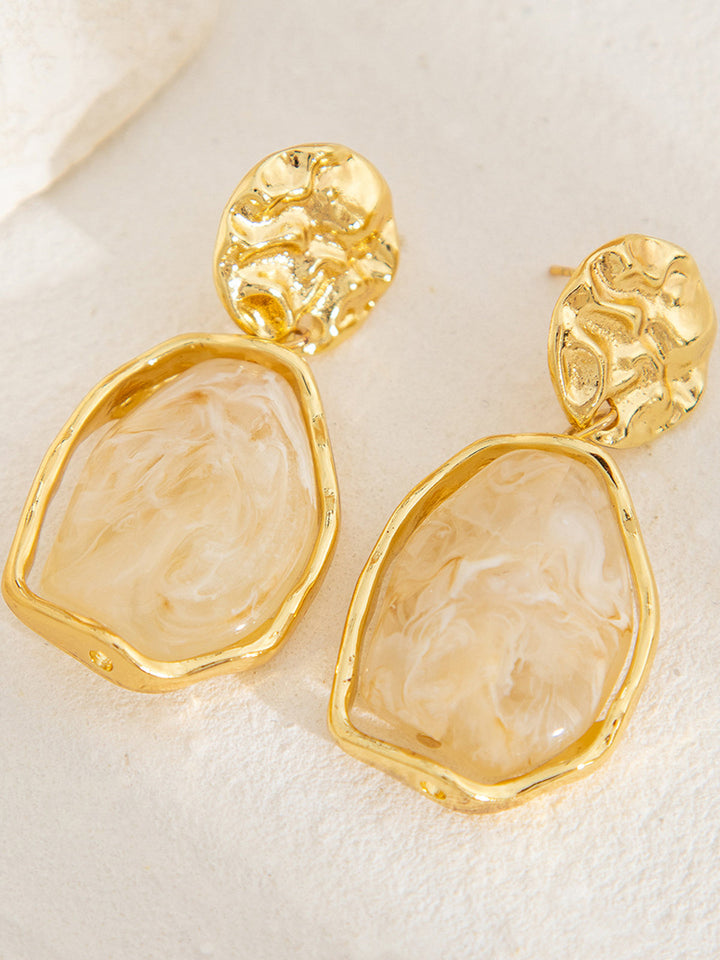 Boucles d'oreilles en pierre irrégulière dorée