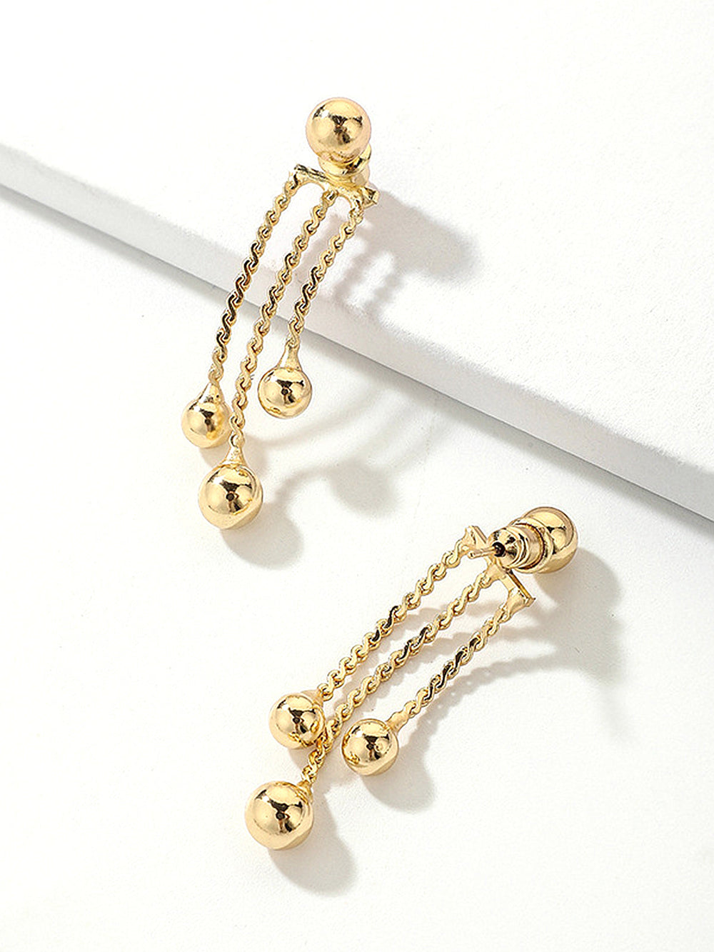 Boucles d'oreilles pendantes dorées