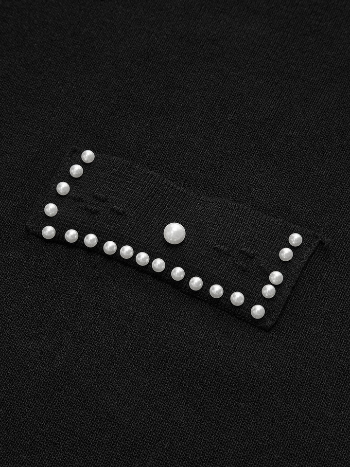 Robe mi-longue en tricot avec bordure en perles