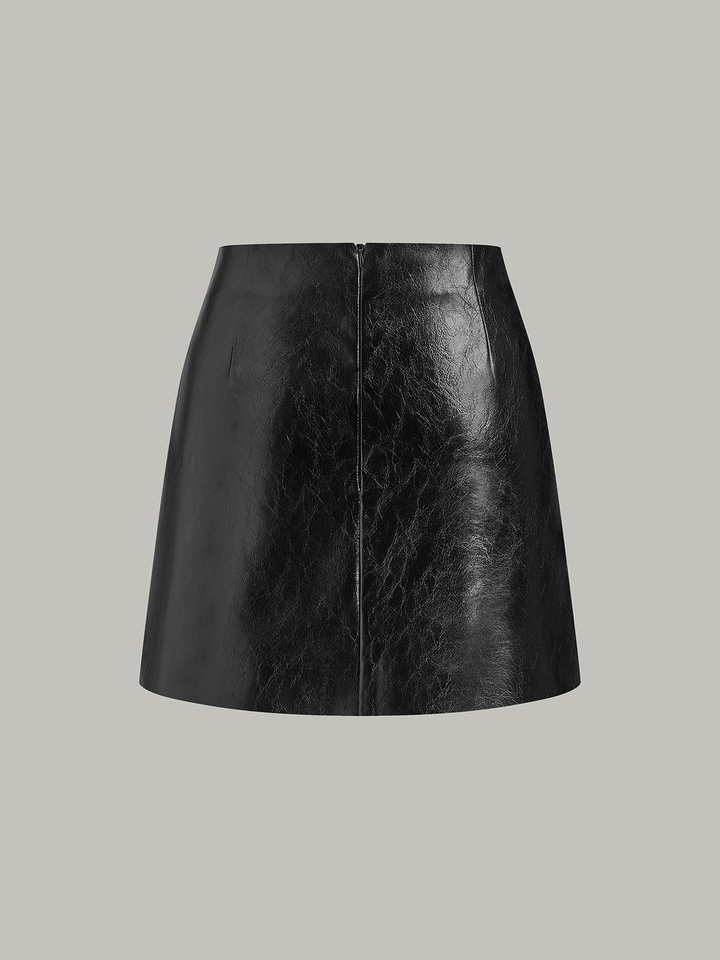 Jupe Mini en Similicuir à Panneaux Plissés de Couleur