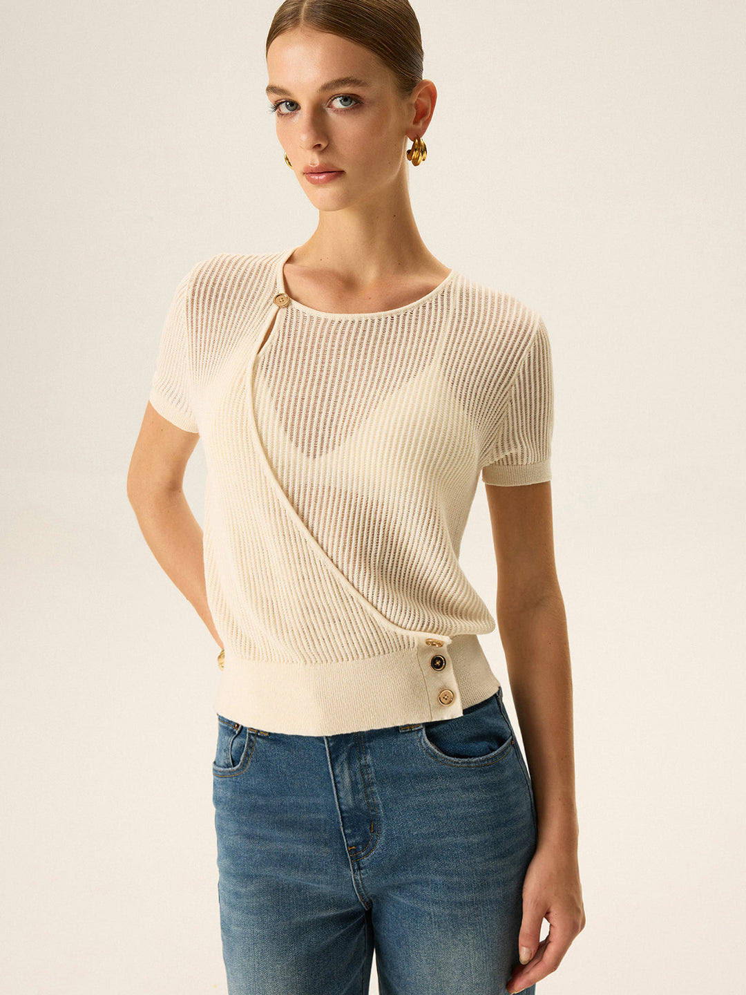 Haut en tricot asymétrique à boutons