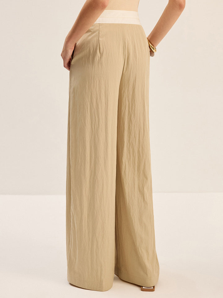 Pantalon large à ceinture contrastante
