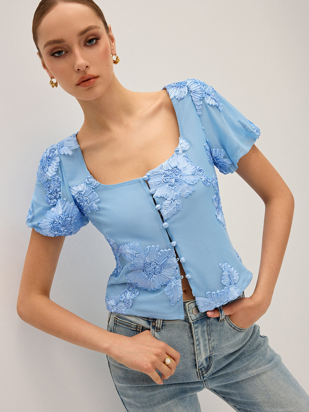 Haut en maille à col carré brodé floral