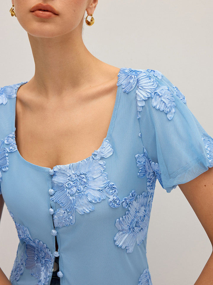Haut en maille à col carré brodé floral