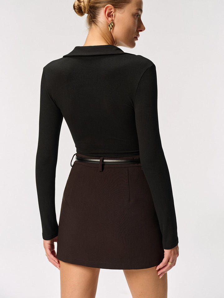 Blouse à manches longues en bouton métallique avec col polo