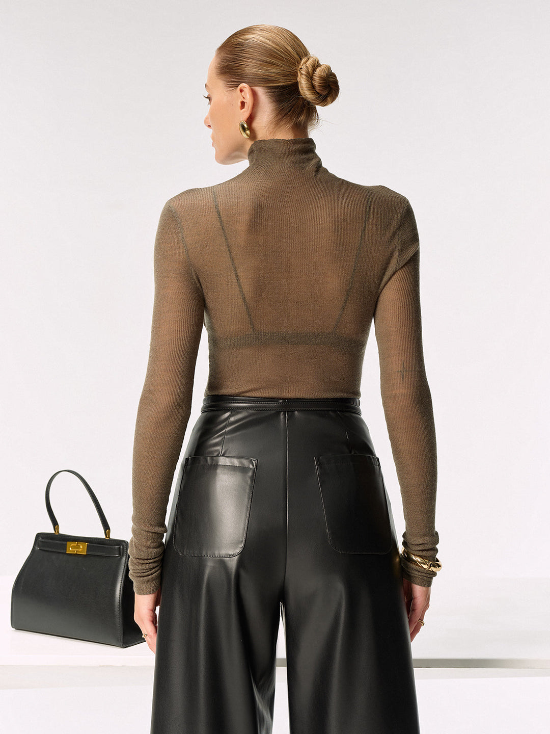 Haut en tricot à col roulé transparent en mélange de laine ajusté