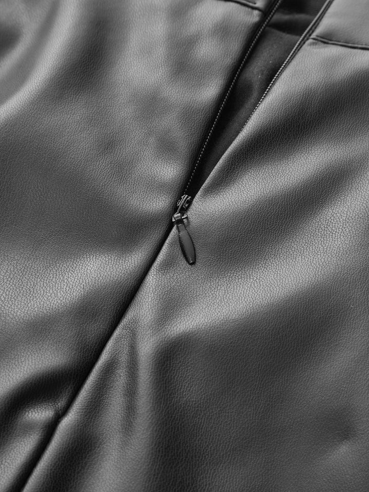 Jupe mi-longue en cuir PU à fente et drapé