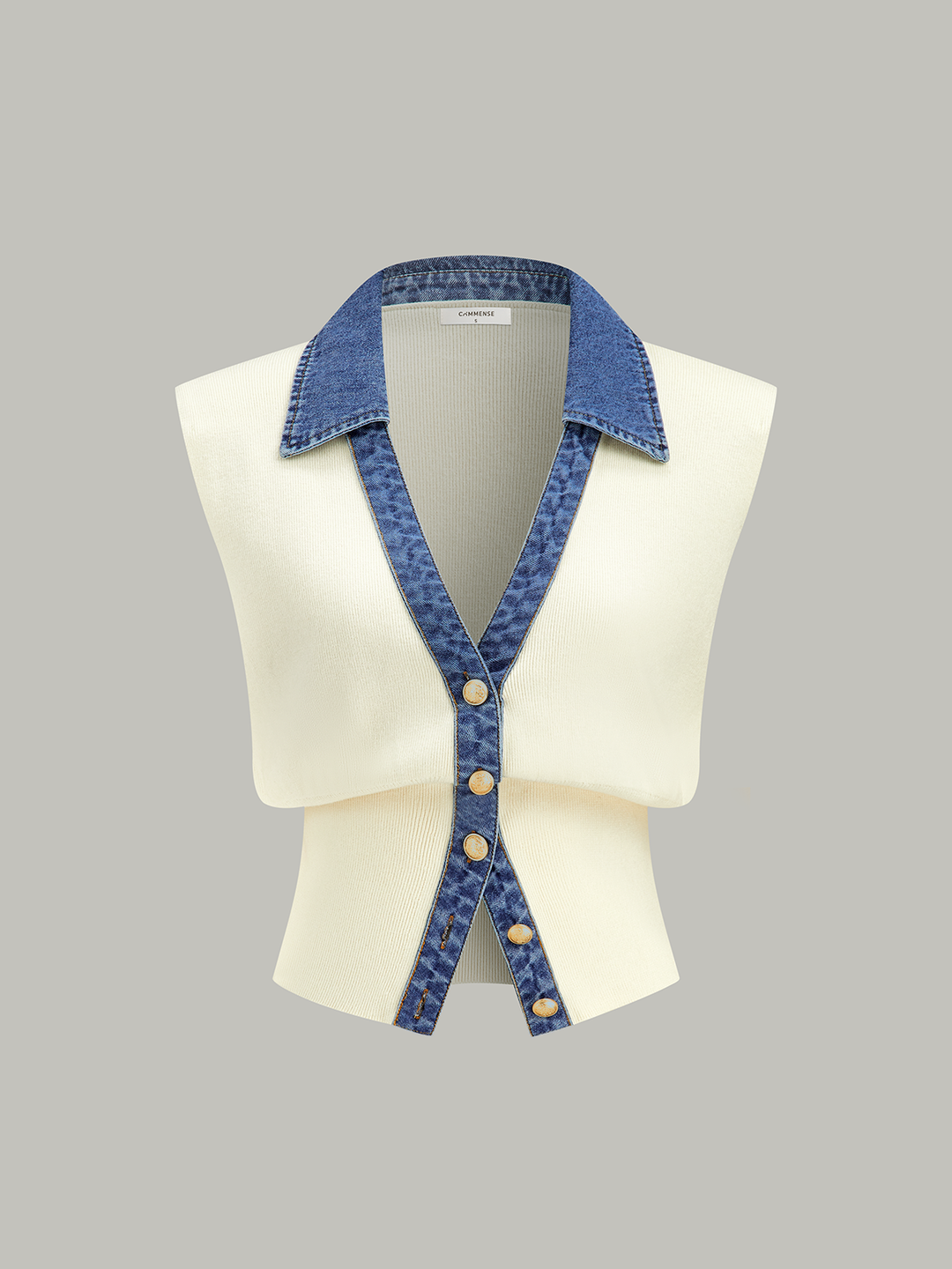 Gilet en tricot à boutons métalliques et bordure en jean