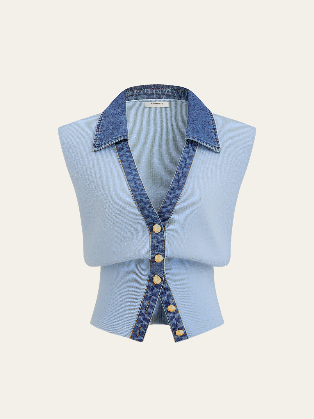 Gilet en tricot à boutons métalliques et bordure en jean